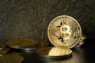 Closeup of bitcoin cryptocurrency with blurred background and copy space