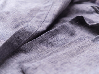 Close up of men's linen shirt. Soft focus.