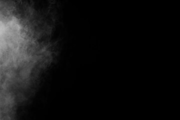 Isolated white fog on the black background, smoky effect for photos and artworks. Smoke and powder...