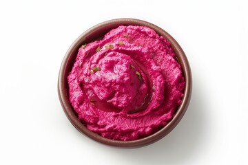 Obraz premium Vivid pink beetroot hummus in a brown bowl, isolated on white