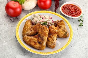 Grilled chicken wings with sauce