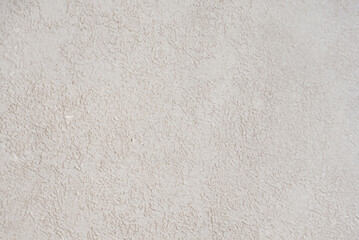 Minimalist Concrete Wall Texture Background with Ample Copy Space.