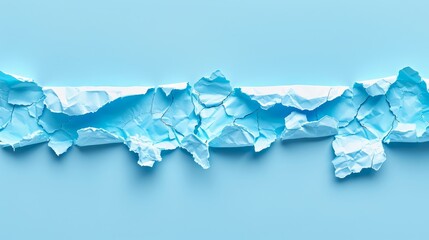   A tight shot of an ice chunk, halved, on a blue backdrop, lies there