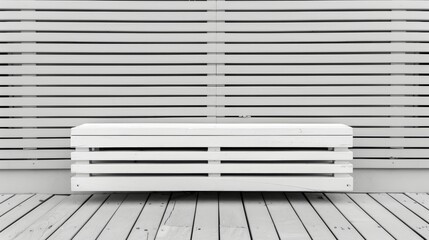   A white bench rests atop a wooden floor Nearby stands a slatted wall, and behind it lies another - obrazy, fototapety, plakaty