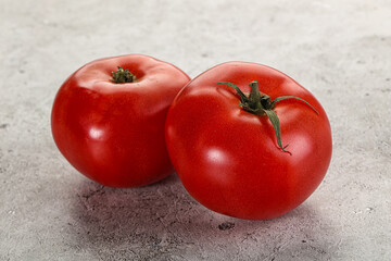 Two ripe sweet organic tomato