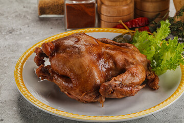 Baked small chicken with spices