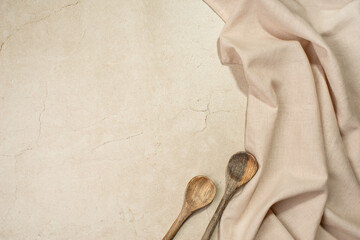 Background with towel, spoons and kitchen board
