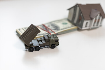 a toy military machine air defense and money - 796929476