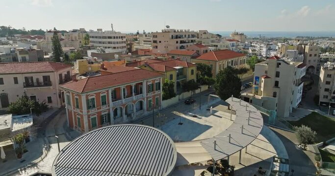 Aerial view of the cityscape of Pathos, Cyprus. Urban architecture of historic streets of tourist town with houses, beautiful roads and life. High quality 4k footage
