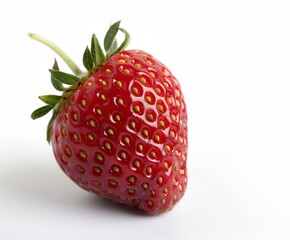 a close up of a strawberry on a white background with a green stem and a red center with yellow tips