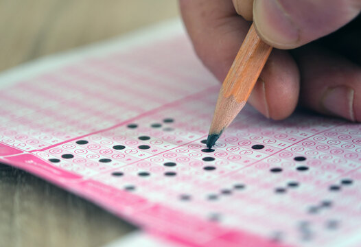 Multiple-choice test exam and marking the answers.