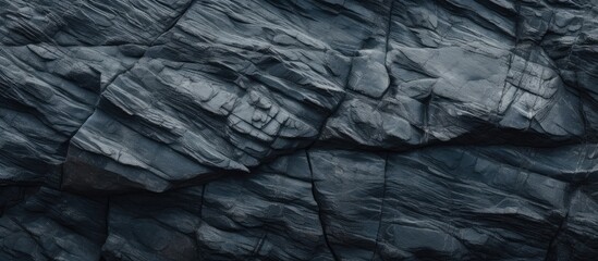 Rugged rock surface against dark backdrop
