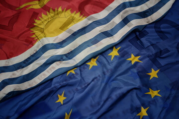 waving colorful flag of european union and flag of Kiribati on a euro money banknotes background. finance concept. - obrazy, fototapety, plakaty