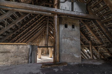Attic of a desserted military building.
