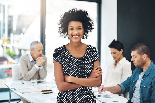 Portrait, woman and smile with crossed arms in office for teamwork, project review and meeting. Female person, happiness and internship in workplace at creative agency in New York city with diversity