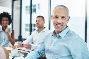Smile, meeting and portrait of mature businessman in office with coffee and documents for financial planning. Discussion, happy and professional male finance advisor working with corporate paperwork.