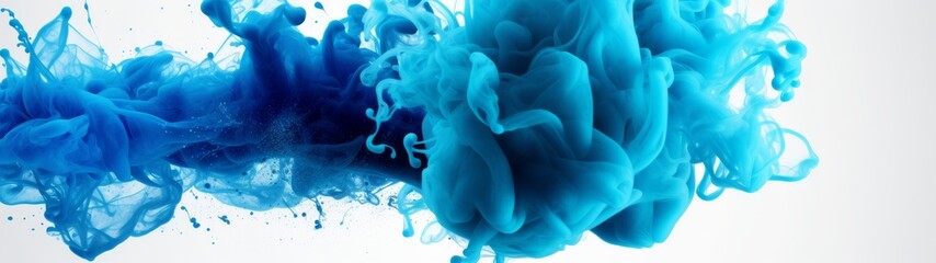 Vibrant blue ink clouds dispersing in water