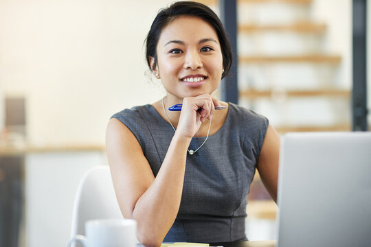 Portrait, laptop and Asian woman in office, smile and confidence for project, editor and corporate. Public relations, review and proofreading of articles, technology and online for company and web