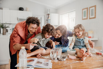 Happy family baking together in the kitchen