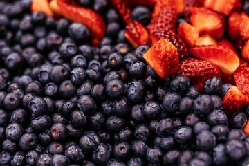 Close up of blackberries and strawberries. 