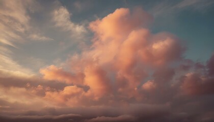 Naklejka na ściany i meble soft pink clouds in a serene sky possibly at sunrise or sunset with a dreamy feel