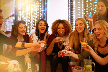 Party, nightclub and women with alcohol shots for birthday celebration, ladies night and social...