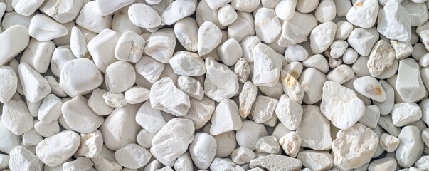 Panoramic view of smooth white pebbles texture as a natural background