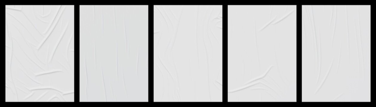 White wrinkled poster template set. Mockup of glued paper isolated on black background.