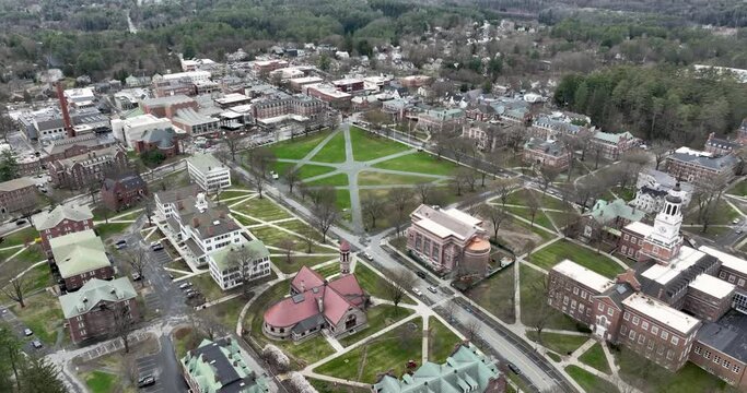 Spring aerial video of Hanover, NH on a partly cloudy day.