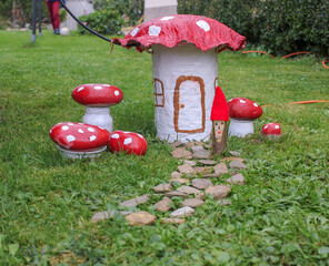 a little mushroom house decorating the garden