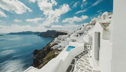white architecture in santorini island greece view of the sea and the blue sky with clouds