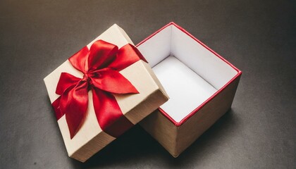 open gift box or present box with red ribbon and bow on black background with shadow - Powered by Adobe