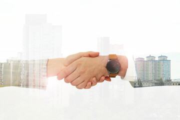 Double exposure of cityscape and partners shaking hands on white background, closeup