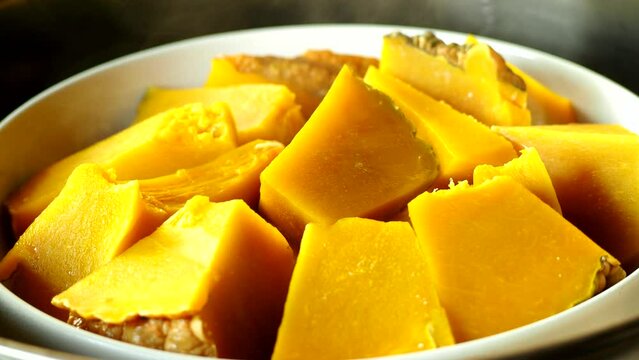 Steaming pumpkin in pot, in door Chiangmai  Thailand.