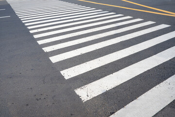Image of an empty pedestrian crosswalk with no people. Zebra cross.