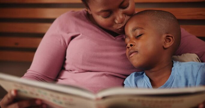Mother, child and reading book for bed time with education, learning and storytelling in language development. African family, kid and happy mom with love and support or helping with literacy at home