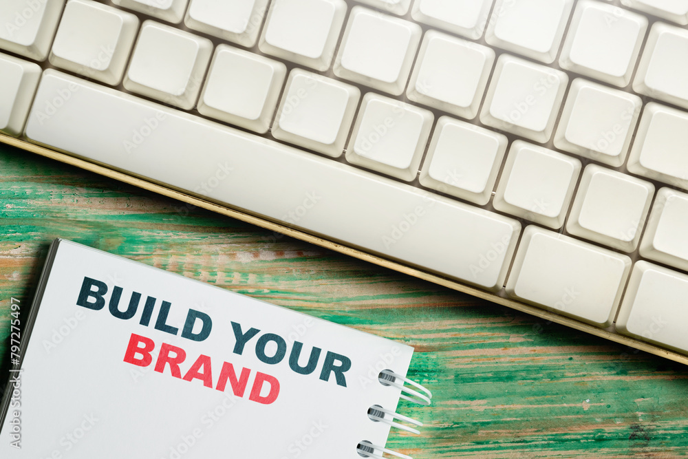 Poster notebook with build your brand text