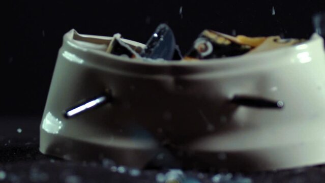 A Vintage Alarm Clock destroyed in slow motion