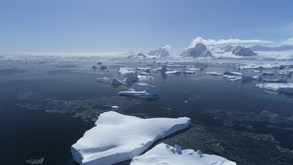 Antarctic Epic Coast Landscape Drone Aerial View. Massive Snow Iceberg Float in Ocean Water at...