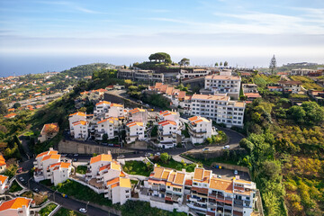 Fototapeta na wymiar Aerial view of Modern villa homes on the hill top in Funchal city, Madeira Island.