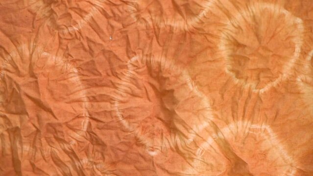 tie dye pattern hand dyed on cotton fabric abstract background.
