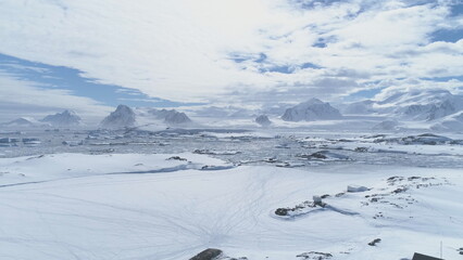 Antarctic Vernadsky Station Majestic Aerial View. Ocean Coast Frozen Water Surface. South Pole...