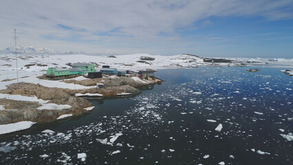 Polar Antarctic Vernadsky Station Aerial View. Ocean Shoreline Open Water Surface Wild Nature....
