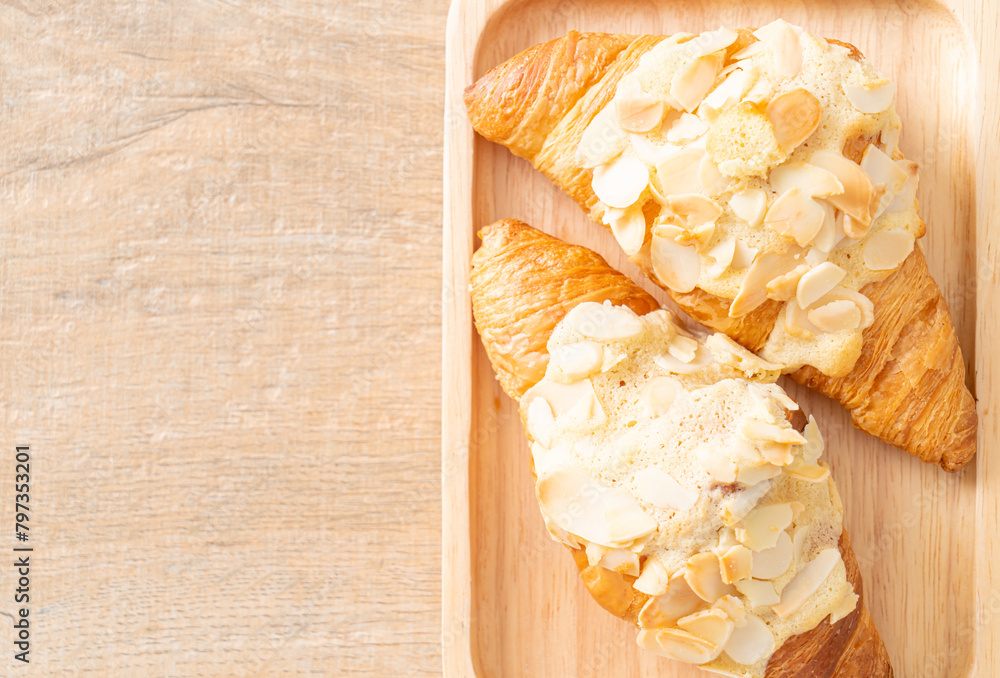 Sticker croissant with cream and almonds