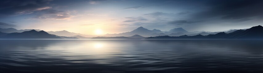 a body of water with mountains in the distance