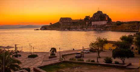 sunset on the coast, popular Kerkyra city, Corfu island, Greece, Europe	