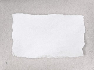 Crumpled piece white parchment baking paper grey concrete background top view