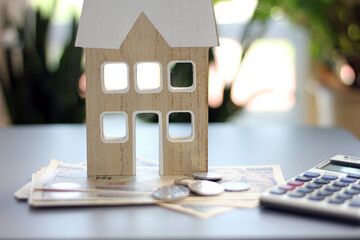 Real estate and finance concept with white piggy bank and Japanese money