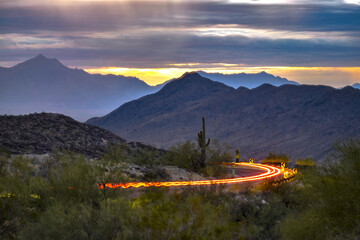Dusk on South Mountain in Phoenix, Arizona.
A long exposure creates a streak of light from the tail...