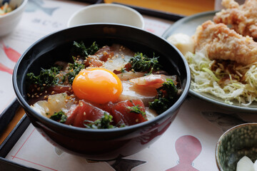 Tuna donburi; a bowl of rice topped with tuna